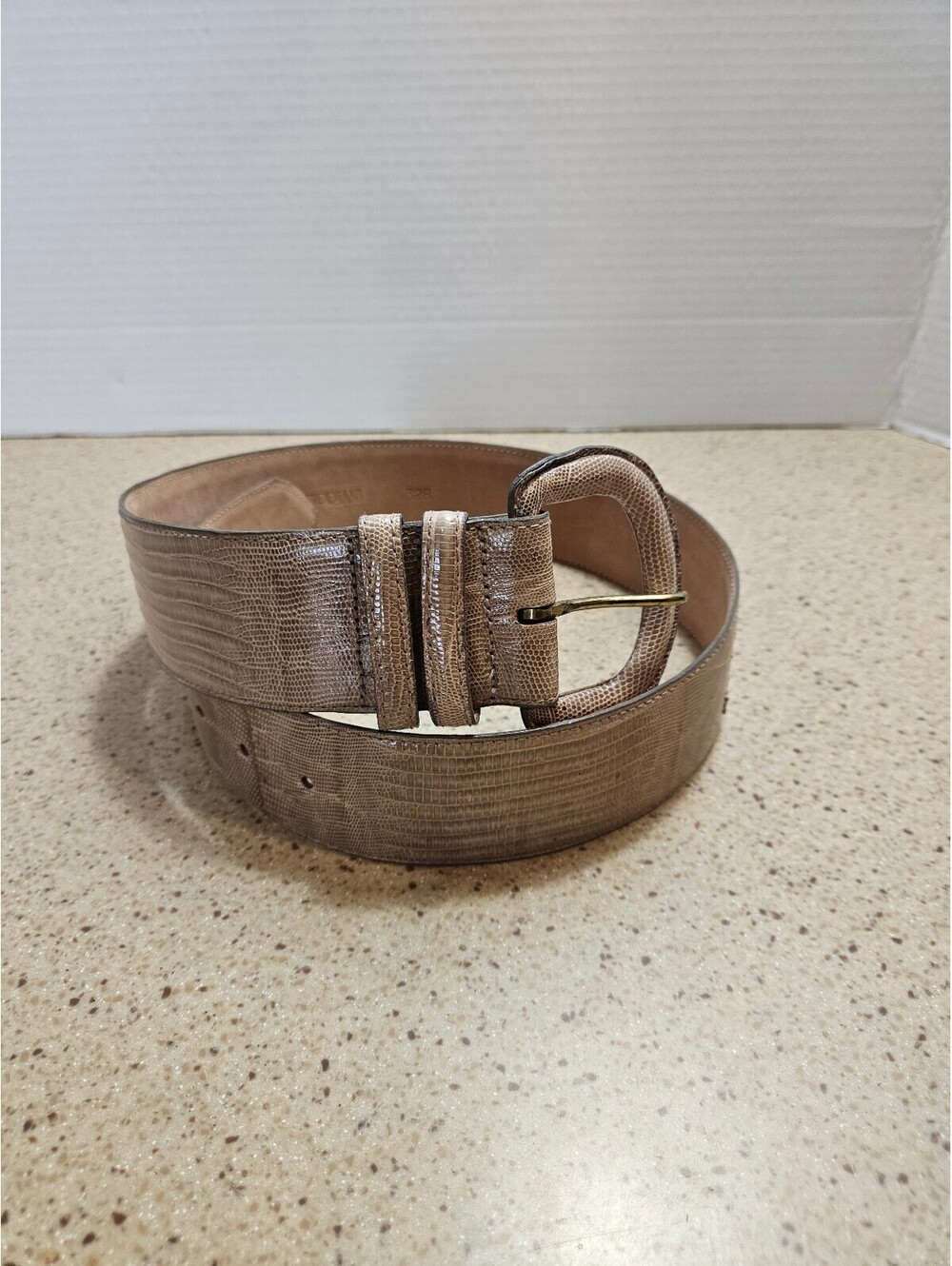 Taupe embossed lizard belt